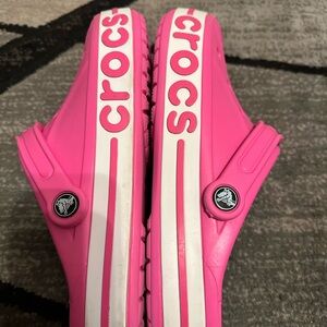 EUC CROCS Bold Pink Clogs with White Stripes